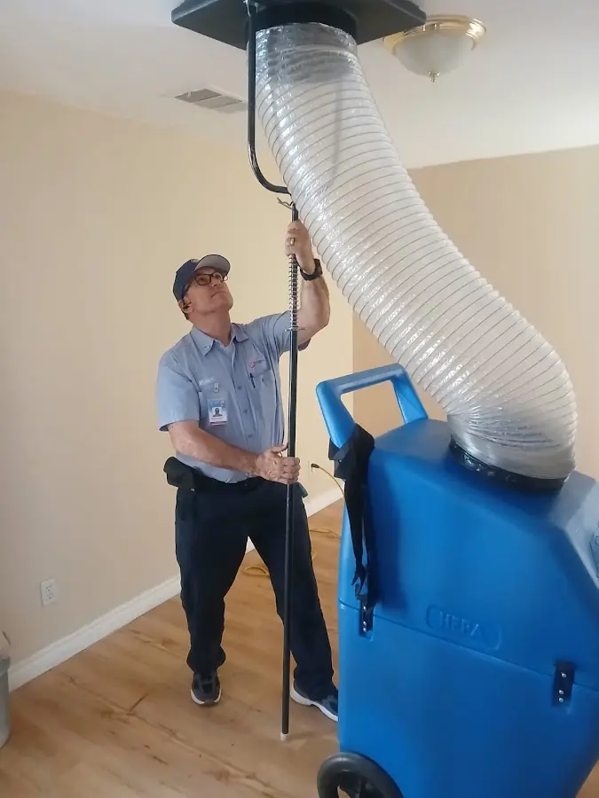 Mini Split Installation technician using HEPA equipment in Muscatine